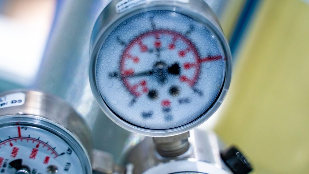 a close up of a foggy gauge